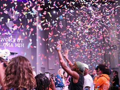 Confetti cannons punctuate the Happy Birthday Song. (Photo by Chariti Mealing, CIU Student Photographer)